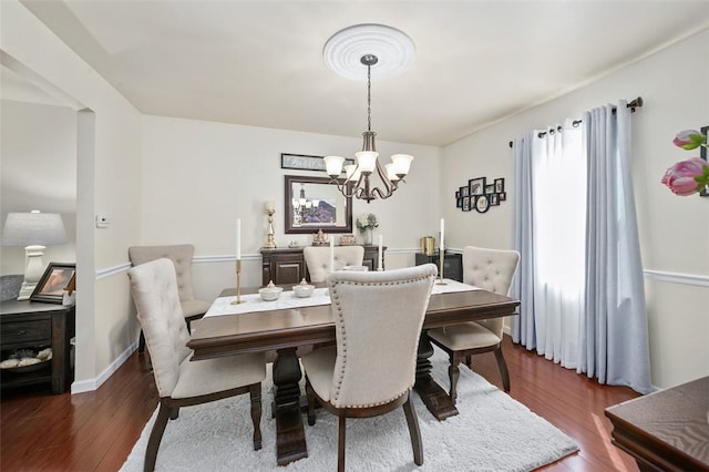 9204 Douglas Fir Dr, Plum Boro, PA 15239 - dining area with wood finished floors and a chandelier