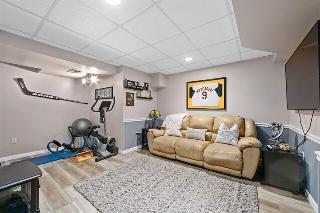 9204 Douglas Fir Dr, Plum Boro, PA 15239 - living room featuring light wood finished floors, a paneled ceiling, baseboards, and recessed lighting