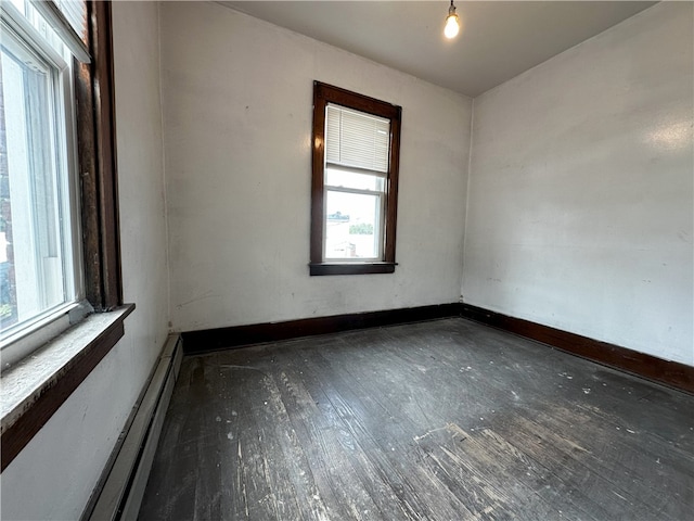 218 Keystone Way, Ellwood City Law, PA 16117 - empty room featuring wood finished floors, baseboards, and a baseboard radiator
