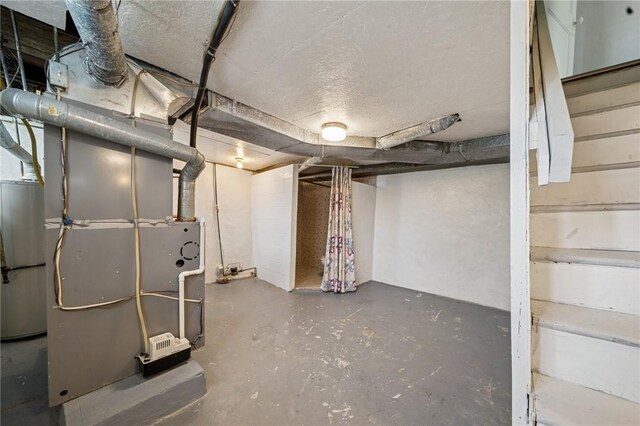 unfinished basement with heating unit