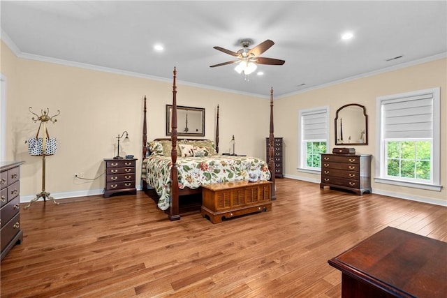 bedroom featuring light wood-style floors, baseboards, crown molding, recessed lighting, and a ceiling fan