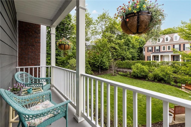 balcony featuring a porch
