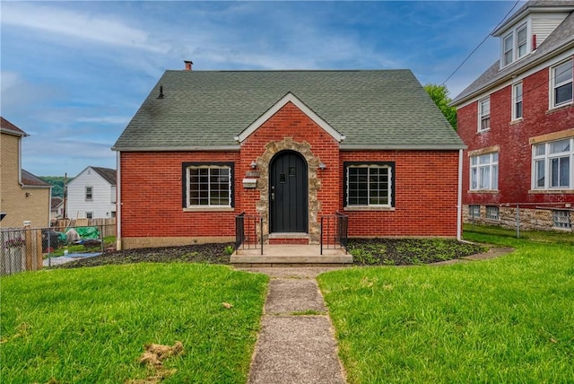 533 Freeport Rd, New Kensington, PA 15068 - view of front of home featuring a shingled roof and brick siding