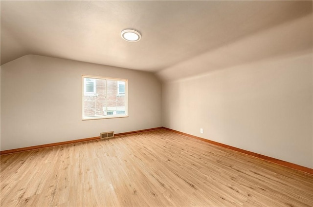 533 Freeport Rd, New Kensington, PA 15068 - additional living space with lofted ceiling, light wood-style flooring, and baseboards