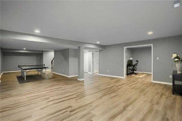 recreation room with light wood-style flooring, baseboards, and recessed lighting