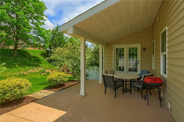 view of patio featuring outdoor dining area and french doors