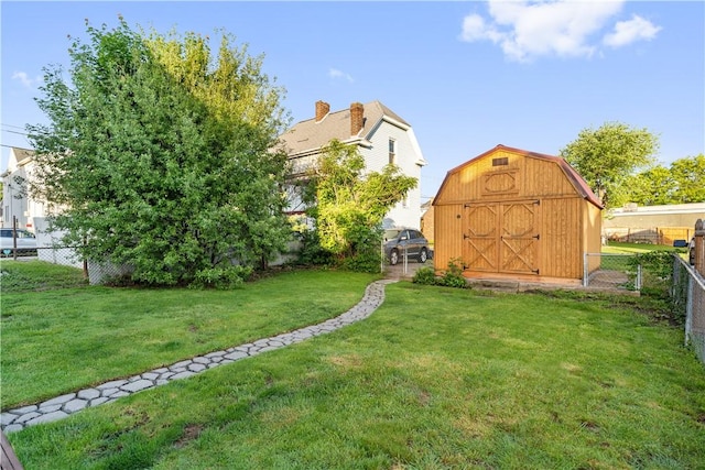 view of yard featuring a shed and an outdoor structure