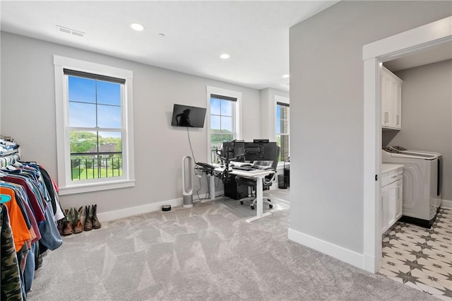 office with baseboards, recessed lighting, washing machine and clothes dryer, and light carpet