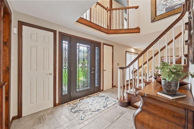 304 Diana Dr, Robinson Twp Nwa, PA 15136 - entryway with stairway, baseboards, and a towering ceiling