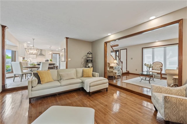 304 Diana Dr, Robinson Twp Nwa, PA 15136 - living area featuring hardwood / wood-style flooring, stairs, a chandelier, and recessed lighting