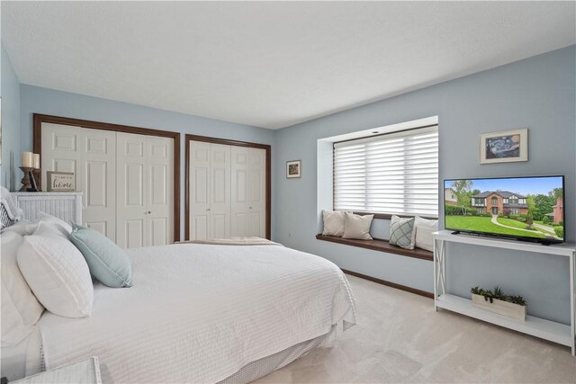304 Diana Dr, Robinson Twp Nwa, PA 15136 - carpeted bedroom featuring multiple closets and baseboards