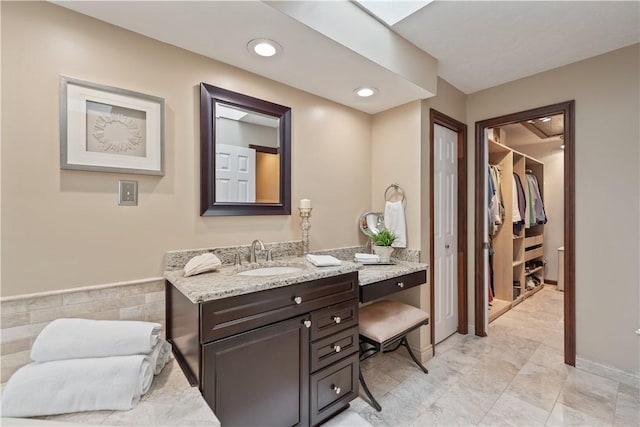 304 Diana Dr, Robinson Twp Nwa, PA 15136 - bathroom with vanity, recessed lighting, and a walk in closet