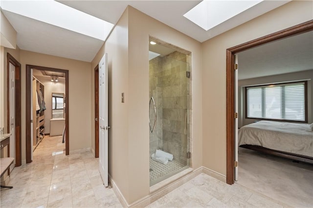 304 Diana Dr, Robinson Twp Nwa, PA 15136 - ensuite bathroom featuring a skylight, baseboards, a stall shower, and vanity