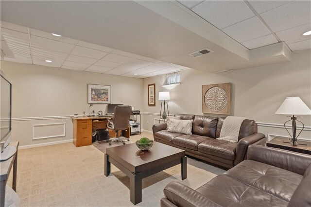 304 Diana Dr, Robinson Twp Nwa, PA 15136 - living room featuring a drop ceiling, an office area, light carpet, a wainscoted wall, and a decorative wall