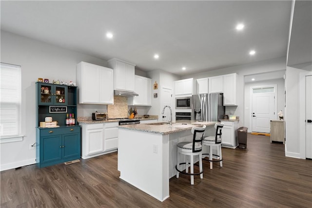 2025 Pinnacle Way S, Park, PA 15129 - kitchen featuring appliances with stainless steel finishes, a sink, dark wood-type flooring, white cabinets, and recessed lighting