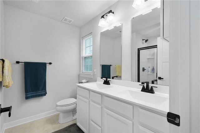 2025 Pinnacle Way S, Park, PA 15129 - bathroom with an enclosed shower, toilet, baseboards, tile patterned flooring, and double vanity