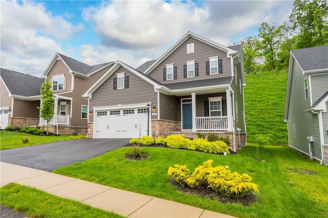 2025 Pinnacle Way S, Park, PA 15129 - view of front facade featuring a porch, driveway, a front yard, and a garage