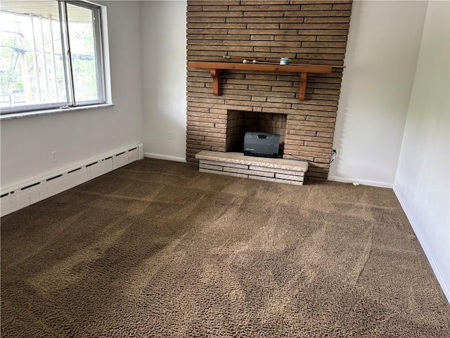 6103 Brownsville Rd, South Park, PA 15236 - unfurnished living room with a baseboard radiator, carpet flooring, and baseboards