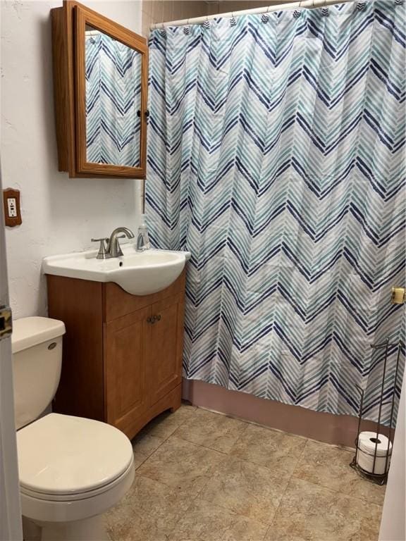 6103 Brownsville Rd, South Park, PA 15236 - bathroom featuring toilet, vanity, and curtained shower