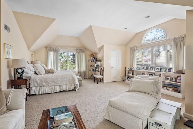 bedroom with light carpet, multiple windows, lofted ceiling, and baseboards