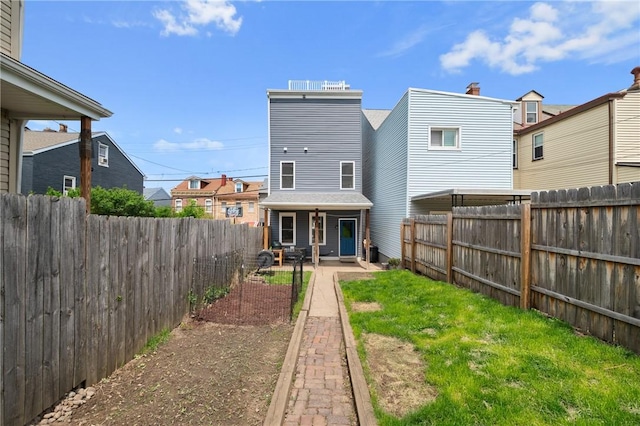 back of property with a patio area