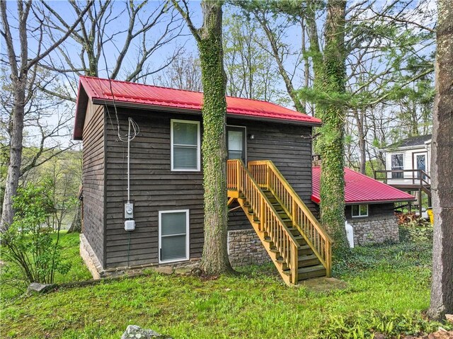 1036 Causeway Dr, Lake Stonycreek, PA 15541 - back of property with metal roof and stairway