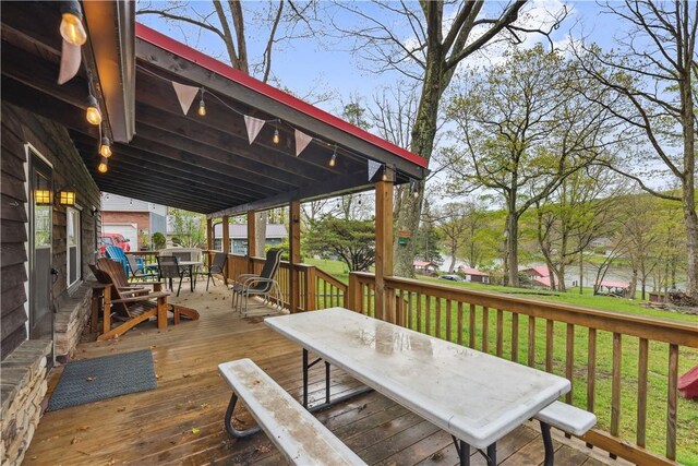 1036 Causeway Dr, Lake Stonycreek, PA 15541 - deck featuring outdoor dining space and a lawn