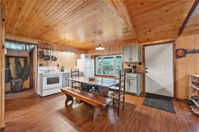 1036 Causeway Dr, Lake Stonycreek, PA 15541 - kitchen with white appliances, wood walls, wood ceiling, and wood finished floors