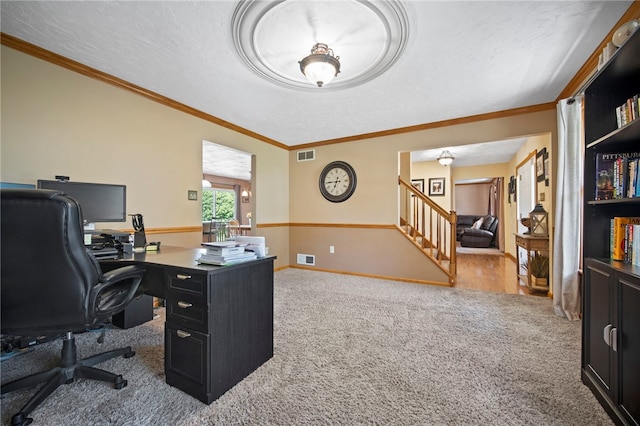 office area featuring carpet, crown molding, a textured ceiling, and baseboards