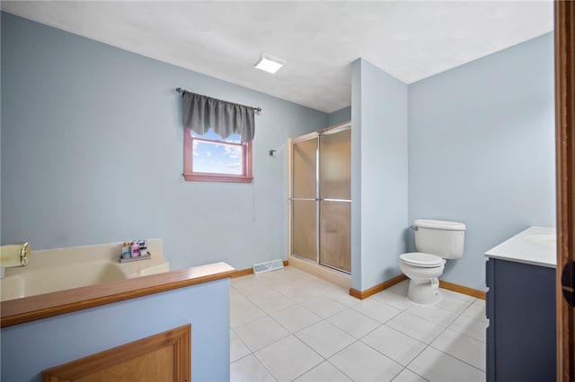 full bath with toilet, vanity, a shower stall, and baseboards