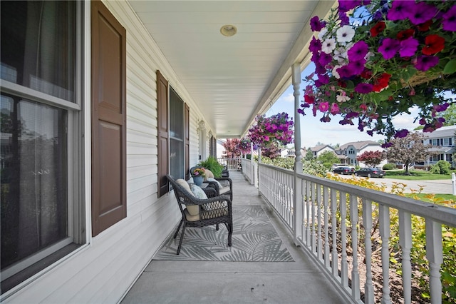 balcony featuring covered porch