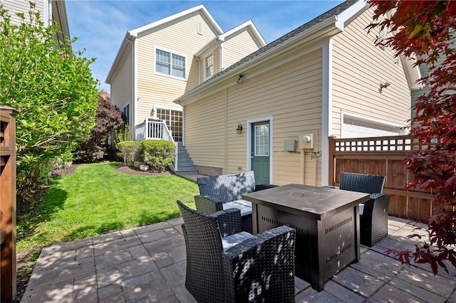 rear view of house with a patio area