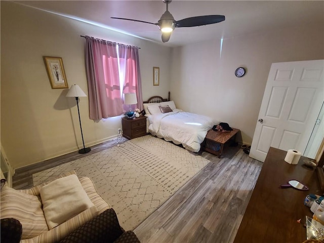 743 Taylor Ave, Avalon, PA 15202 - bedroom with wood finished floors, ceiling fan, and baseboards