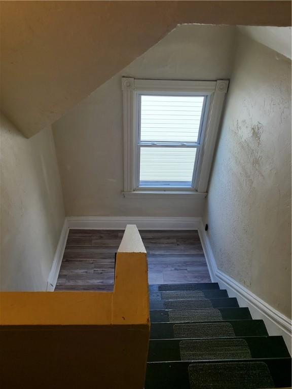 743 Taylor Ave, Avalon, PA 15202 - additional living space with wood finished floors, lofted ceiling, and baseboards