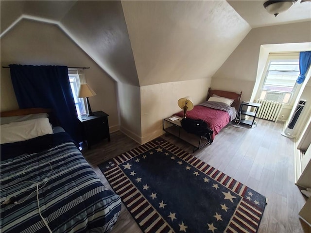 743 Taylor Ave, Avalon, PA 15202 - bedroom with lofted ceiling, wood finished floors, and baseboards