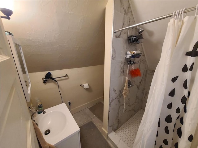 743 Taylor Ave, Avalon, PA 15202 - full bathroom with vaulted ceiling, a tile shower, and vanity