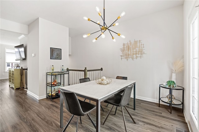 128 Cole Dr, Robinson Twp Nwa, PA 15136 - dining space with dark wood-type flooring, a chandelier, and plenty of natural light