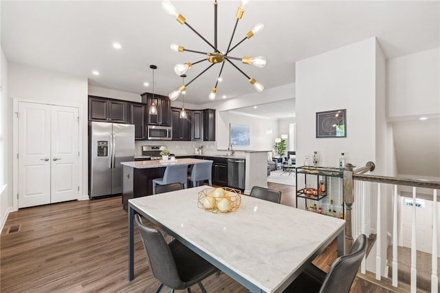 128 Cole Dr, Robinson Twp Nwa, PA 15136 - dining room featuring a chandelier, wood finished floors, and recessed lighting