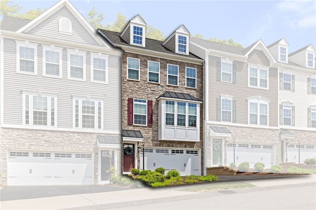 128 Cole Dr, Robinson Twp Nwa, PA 15136 - townhome / multi-family property featuring stone siding, an attached garage, and driveway