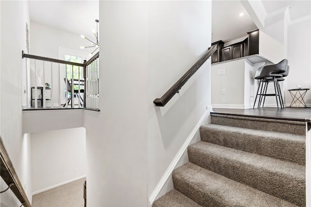 128 Cole Dr, Robinson Twp Nwa, PA 15136 - stairway with a chandelier, carpet flooring, crown molding, and recessed lighting