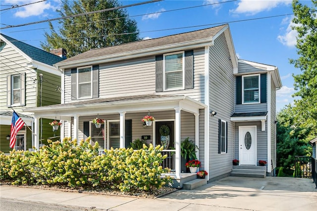 traditional-style home with a porch