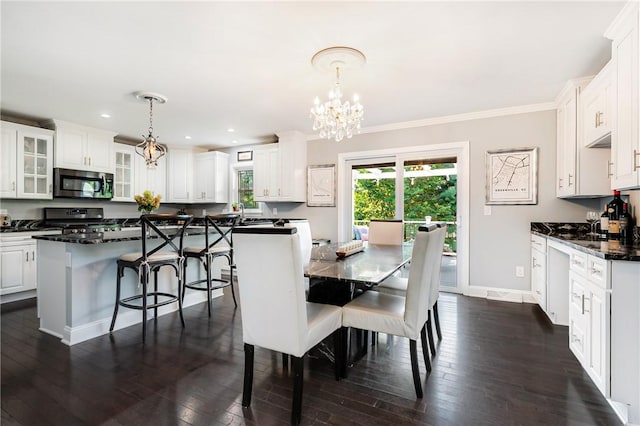 dining area featuring a chandelier, ornamental molding, dark wood-style floors, baseboards, and recessed lighting