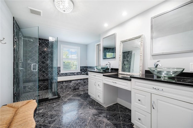 full bath with a shower stall, a garden tub, double vanity, and recessed lighting