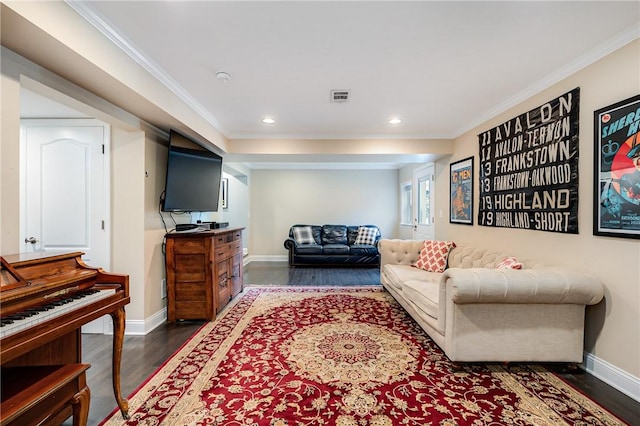 living room with dark wood-style floors, crown molding, baseboards, and recessed lighting