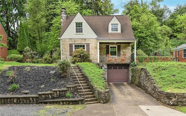 811 Jefferson Dr, Ross Twp, PA 15229 - view of front of home with stone siding, stairs, driveway, an attached garage, and a chimney
