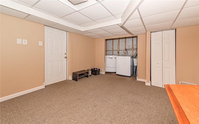 811 Jefferson Dr, Ross Twp, PA 15229 - finished below grade area with washer and dryer, a paneled ceiling, carpet flooring, and baseboards