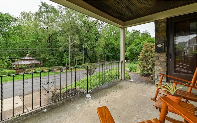811 Jefferson Dr, Ross Twp, PA 15229 - view of patio / terrace featuring a gazebo, view of scattered trees, and a balcony