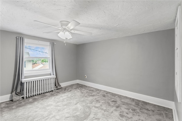 247 Pringle St, Banksville/Westwood, PA 15106 - empty room with carpet, baseboards, radiator heating unit, a ceiling fan, and a textured ceiling