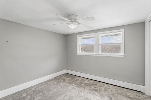 247 Pringle St, Banksville/Westwood, PA 15106 - carpeted empty room with a baseboard heating unit, ceiling fan, and baseboards