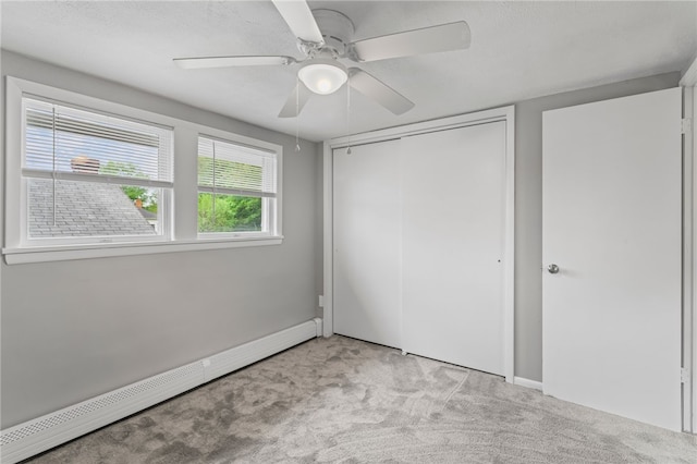 247 Pringle St, Banksville/Westwood, PA 15106 - unfurnished bedroom with baseboard heating, light carpet, a closet, ceiling fan, and baseboards